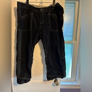 Funny and funky black capri with roll tab bottoms